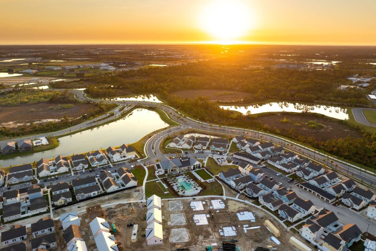 sun rising over greenfield development