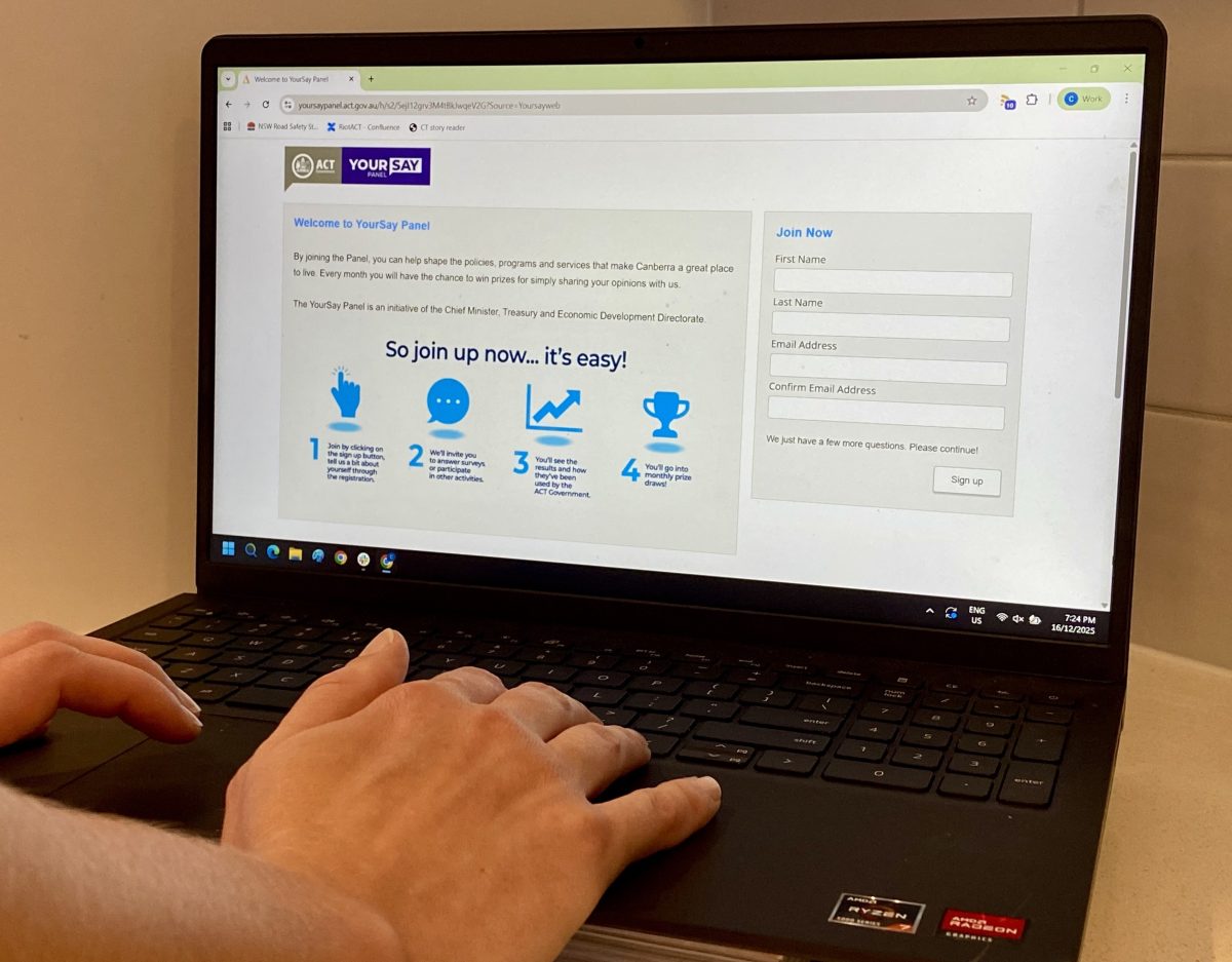 close-up of a person using a laptop