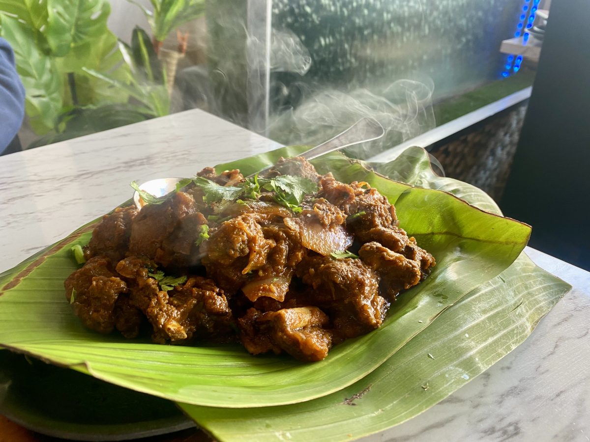 Goat curry on a banana leaf.