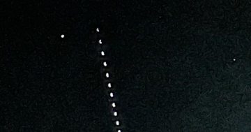 Behold the 'space centipede': Weird series of lights spotted over Canberra's night sky