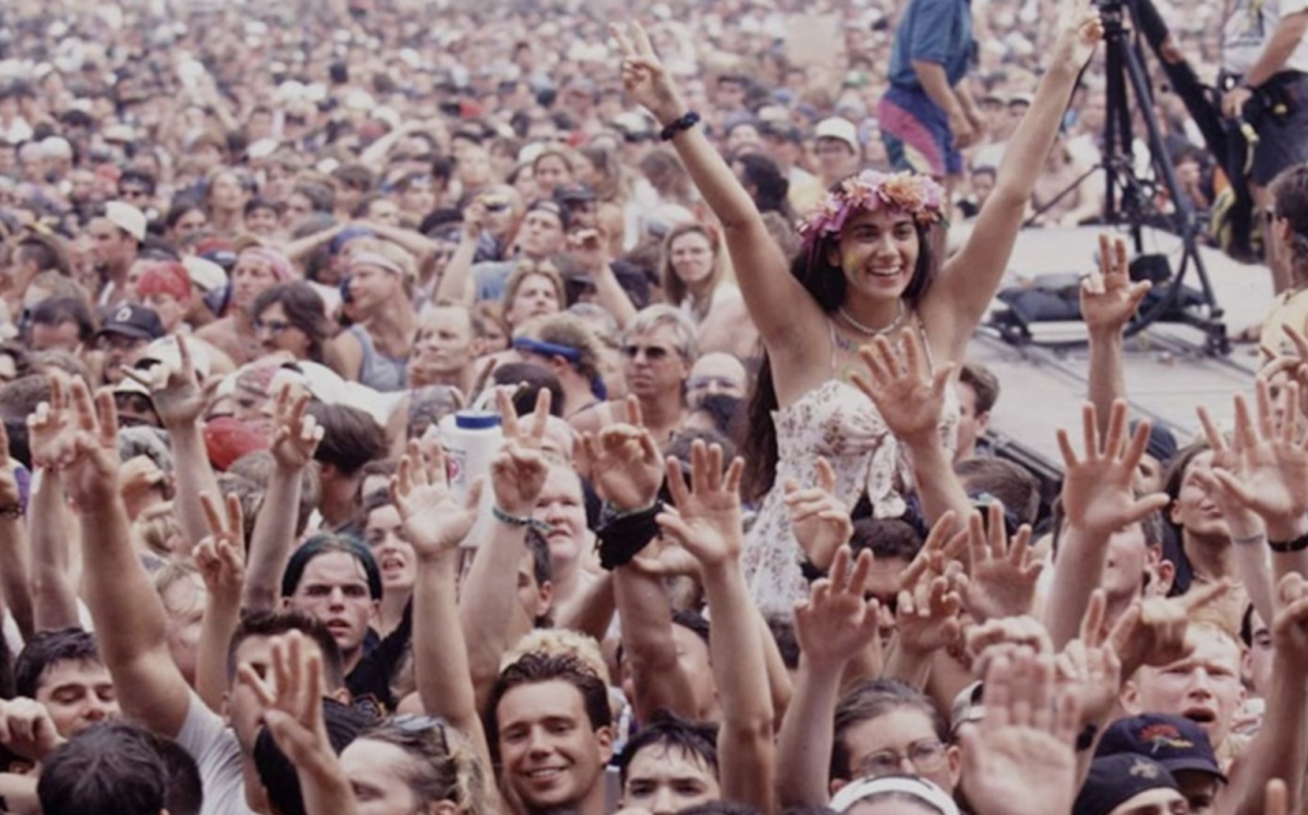 Happy crowds at 1960s Woodstock festival
