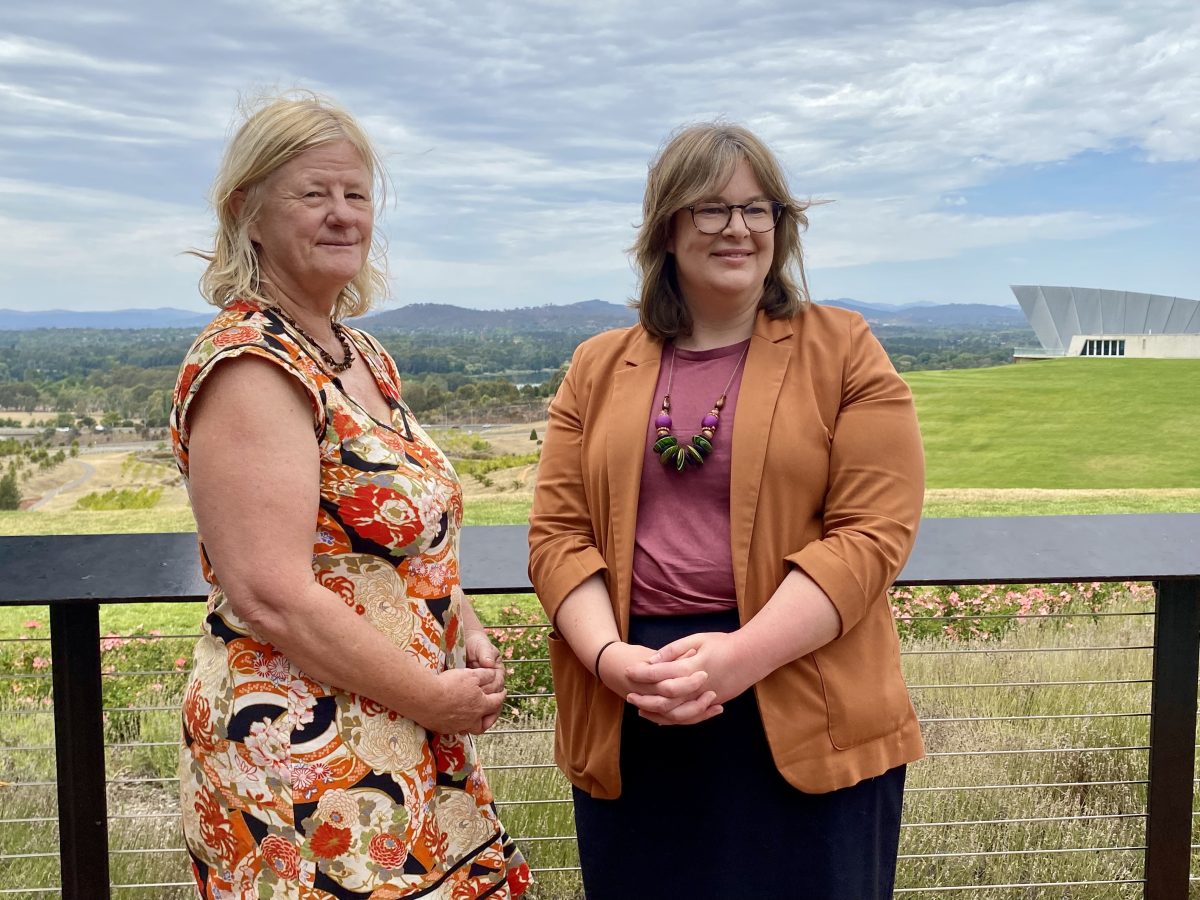 two women standing next to each other