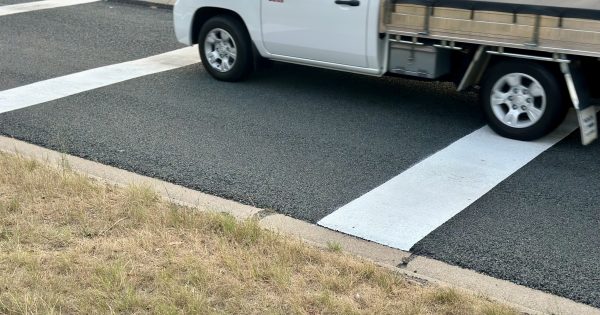Why many of Tuggeranong's roads are turning white