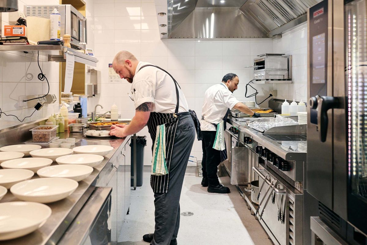 chefs working in a commercial kitchen