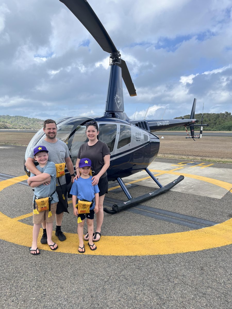 family photo with a helicopter