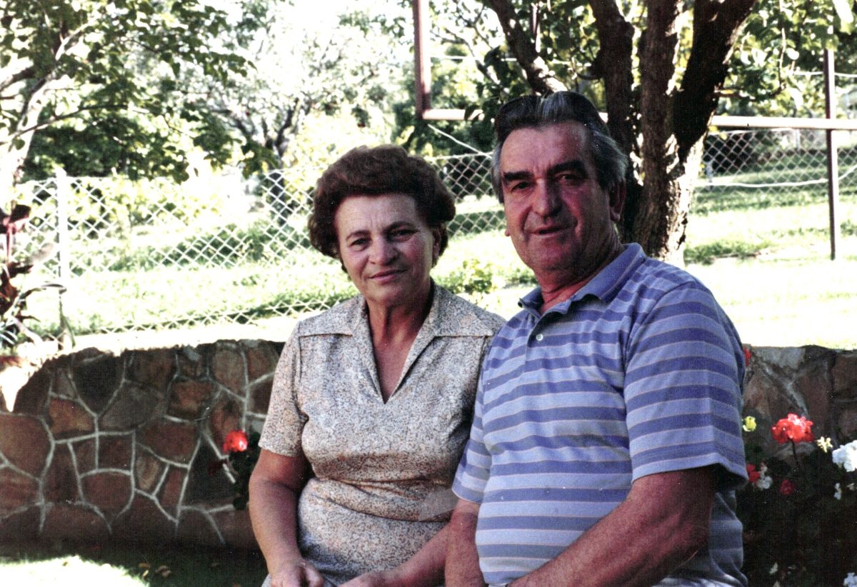 a woman and a man sitting next to each other