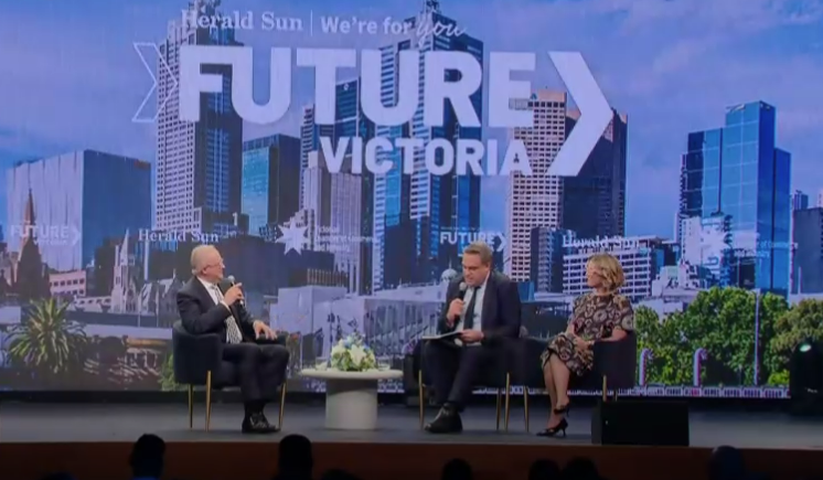 Anthony Albanese with a microphone