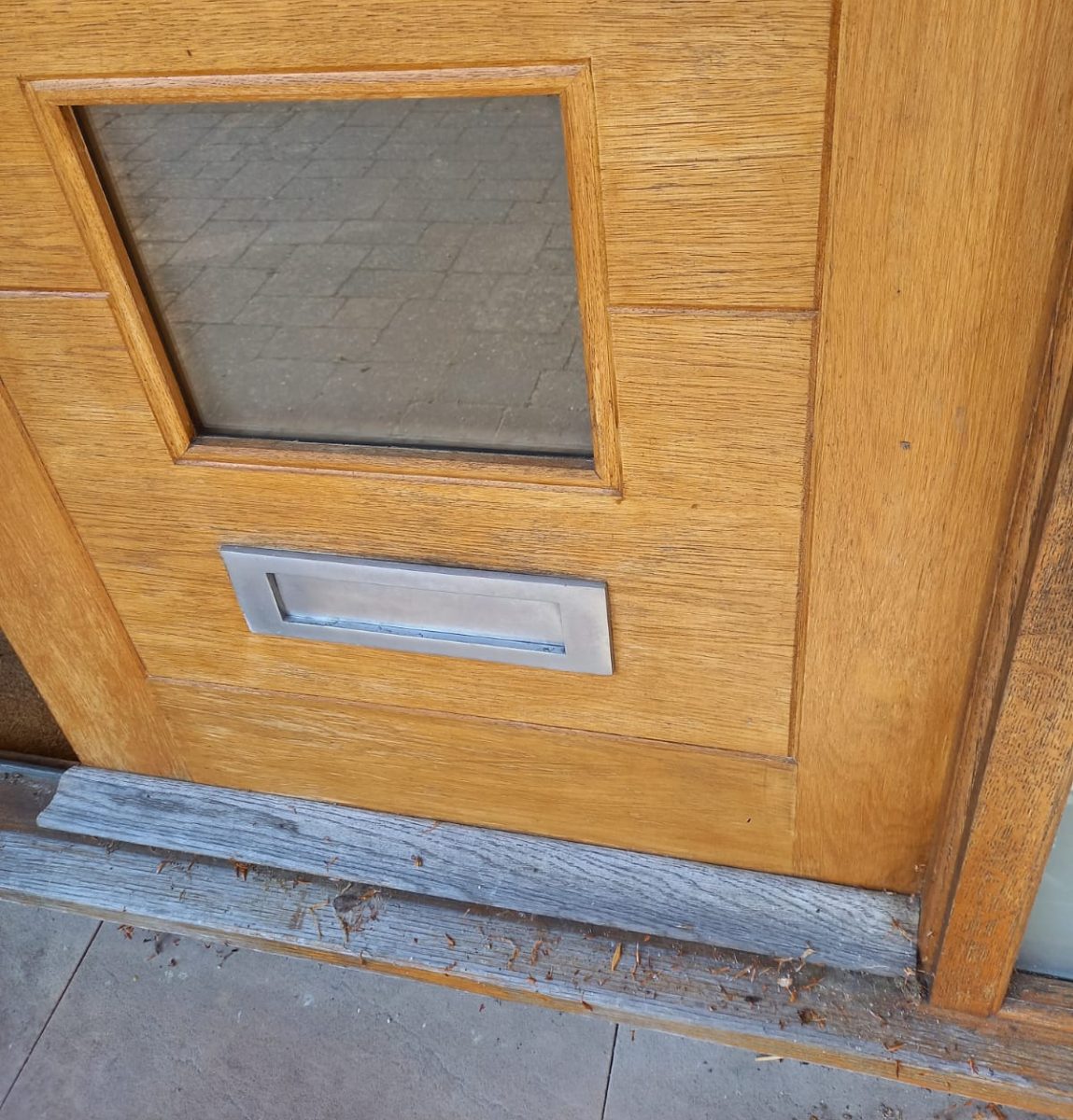 Mailbox slot in door