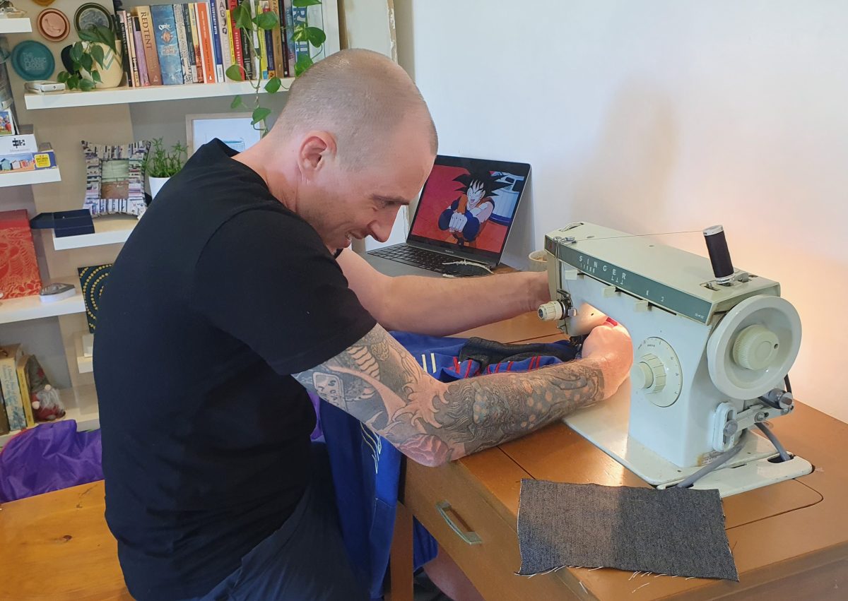 Mending a pair of pants while watching cartoons? The perfect relaxation activity if you've got ADHD.