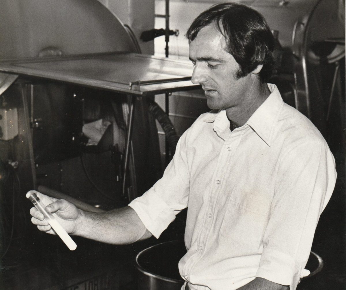 Black and white photo of Geoff Boxsell in the lab