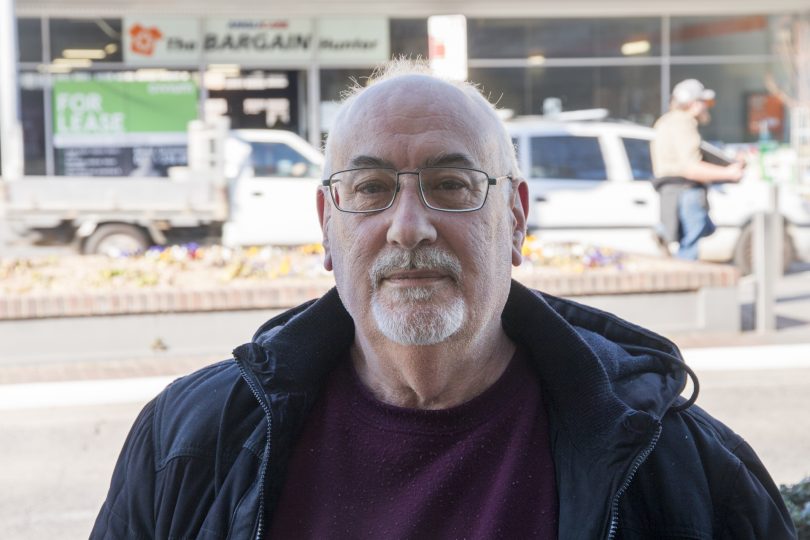 Bill Furneaux standing on street.