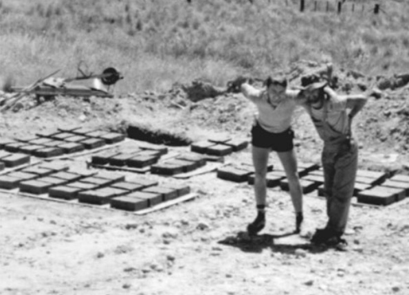 Richard Glover and Philip Clark making mud bricks.