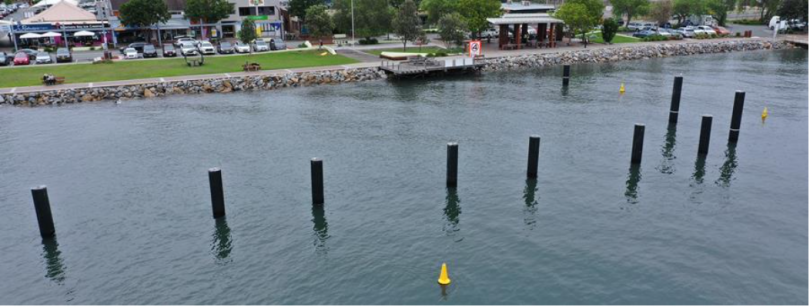 Pontoon piles in water