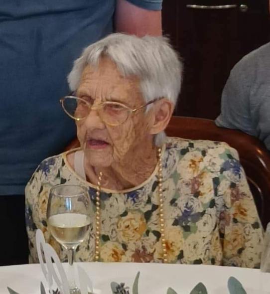 Old lady with champagne.