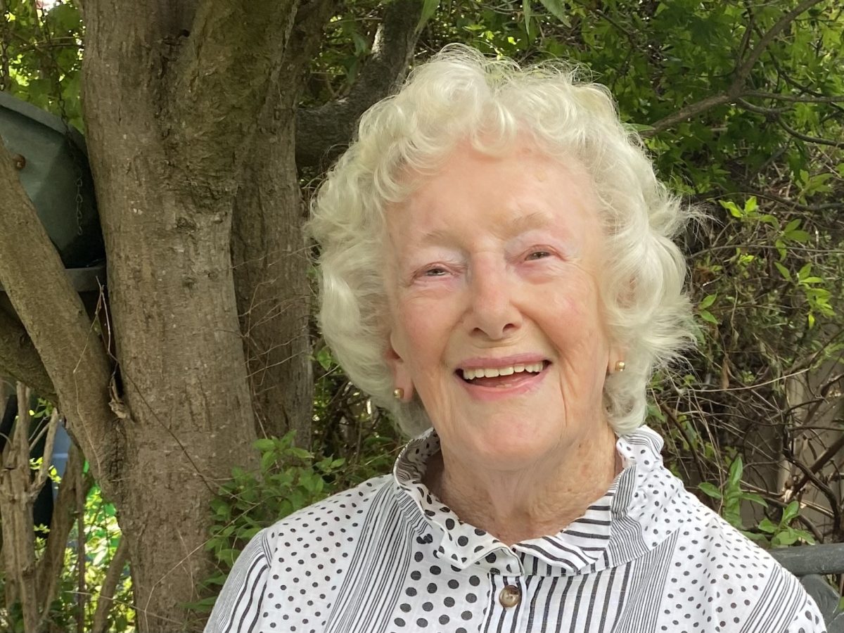 Rita Fry in her North Goulburn garden, where she has an aviary full of birds including zebra finches which remind her of her late husband, Ossie, a keen breeder.