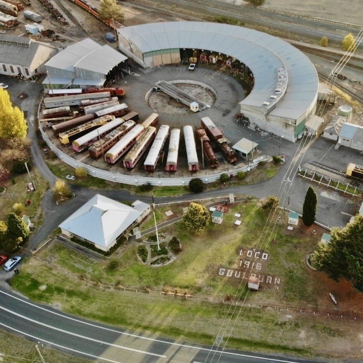 This aerial photograph shows workshops and loco sheds surrounding the 90-foot turntable which brings engines to Goulburn for regular maintenance.