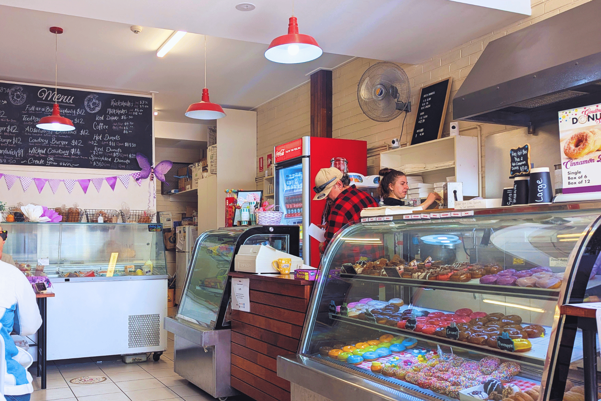 Inside a cafe and donuts shop.