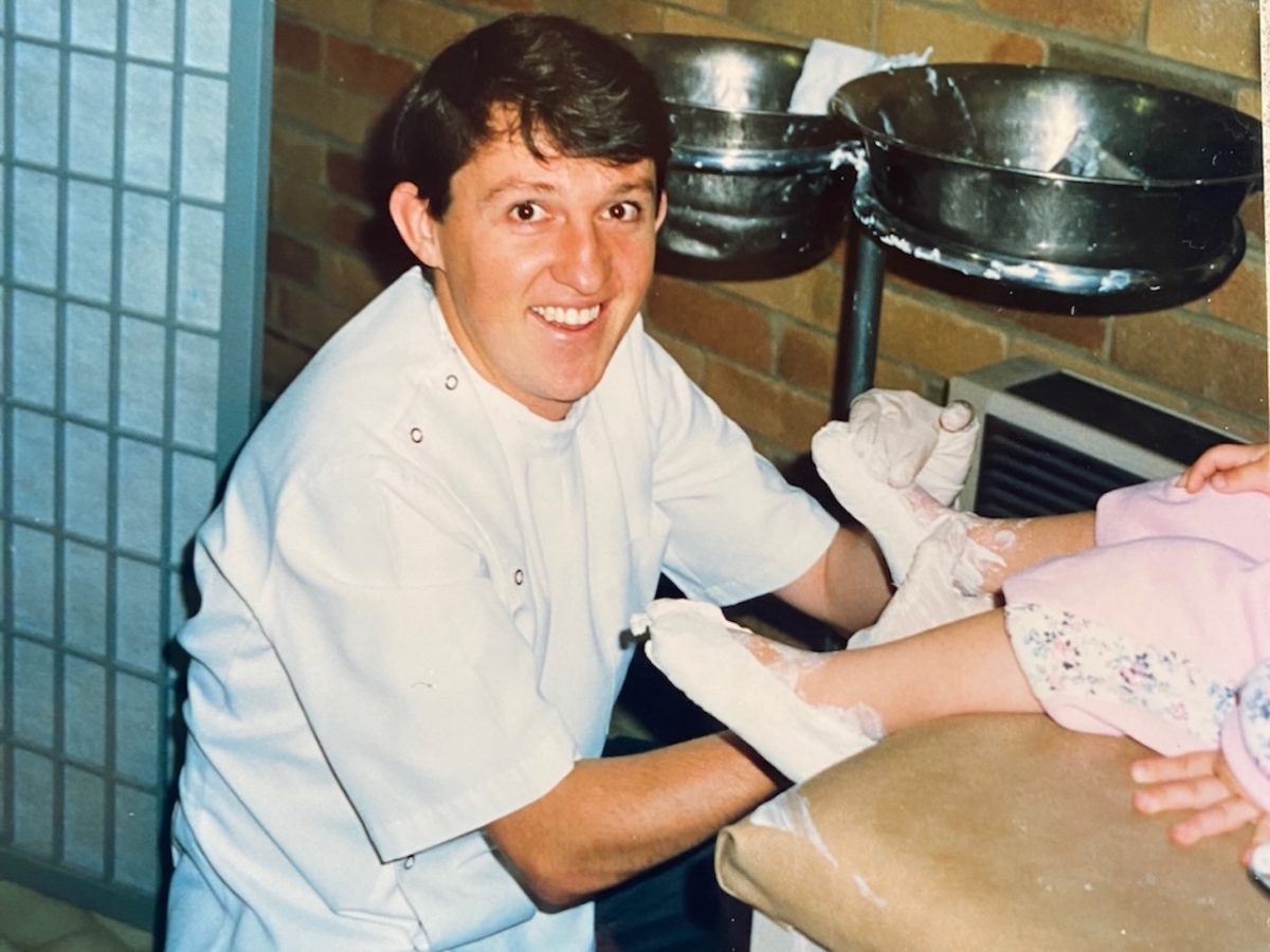 Dominic making an orthotics mould for one of his patients.